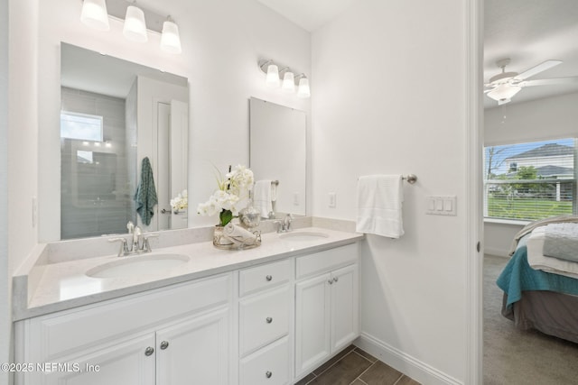 220 Killarney Ave, Saint Johns, FL 32259 - ensuite bathroom featuring double vanity, plenty of natural light, a ceiling fan, and a tile shower