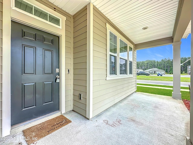65274 Forest Glen Ln, Yulee, FL 32097 - view of exterior entry with covered porch
