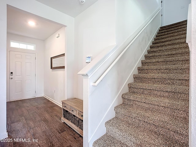 65274 Forest Glen Ln, Yulee, FL 32097 - foyer entrance with stairs, dark wood finished floors, and baseboards