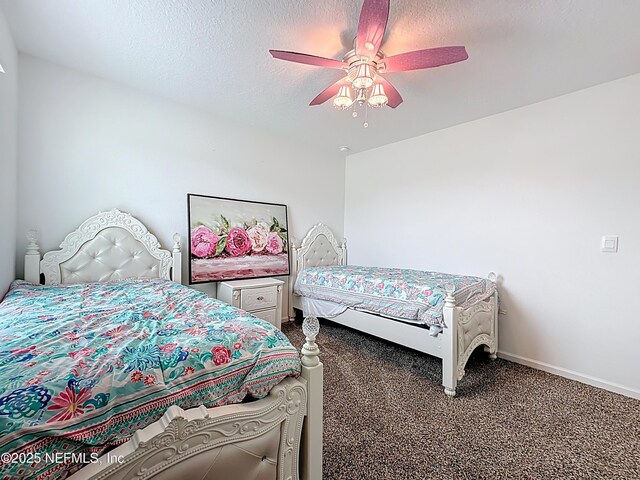 65274 Forest Glen Ln, Yulee, FL 32097 - carpeted bedroom featuring ceiling fan, a textured ceiling, and baseboards