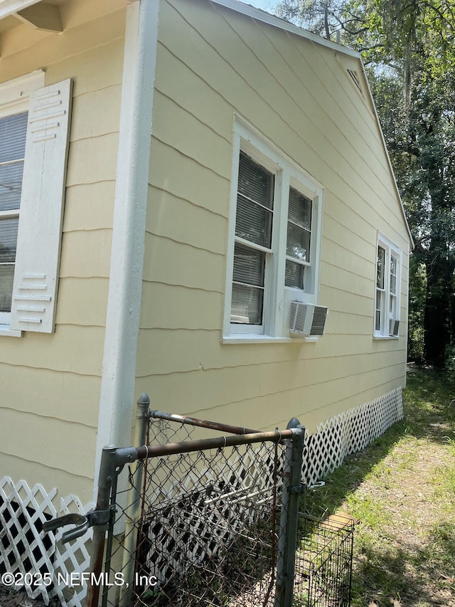 1050 Alderside St, Jacksonville, FL 32208 - view of side of property featuring cooling unit