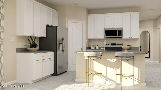 100 Round Robin Run, Saint Johns, FL 32259 - kitchen with range with electric stovetop, stainless steel fridge with ice dispenser, white cabinetry, and light wood-style flooring