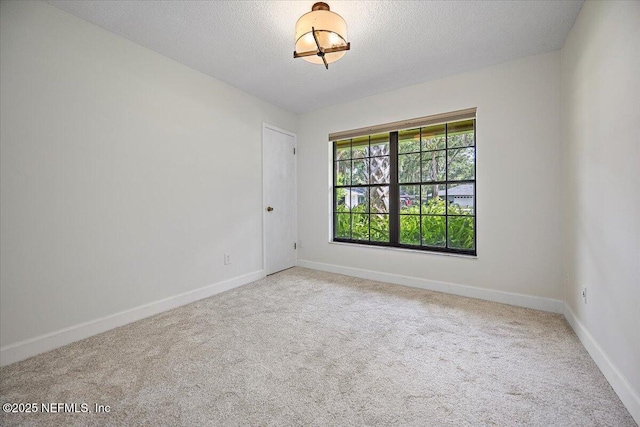 100 Palmera Ct, Ponte Vedra Beach, FL 32082 - carpeted spare room featuring baseboards and a textured ceiling