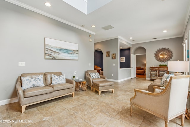 96266 Dowling Dr, Yulee, FL 32097 - living room with arched walkways, ornamental molding, recessed lighting, baseboards, and light tile patterned floors