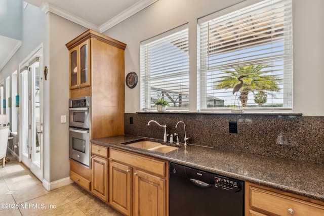 96266 Dowling Dr, Yulee, FL 32097 - kitchen with black dishwasher, double oven, a sink, crown molding, and light tile patterned floors