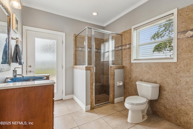 96266 Dowling Dr, Yulee, FL 32097 - full bath featuring vanity, tile patterned floors, toilet, and a shower stall