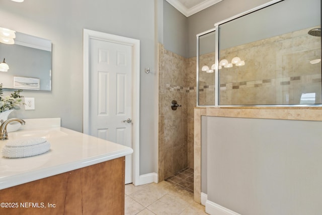 96266 Dowling Dr, Yulee, FL 32097 - bathroom with crown molding, walk in shower, vanity, tile patterned flooring, and baseboards