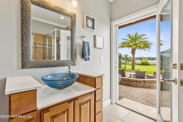 96266 Dowling Dr, Yulee, FL 32097 - bathroom featuring vanity, a shower stall, and tile patterned flooring