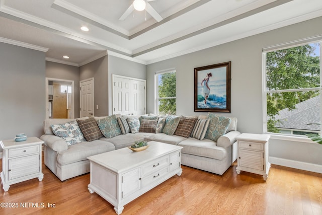 96266 Dowling Dr, Yulee, FL 32097 - living area with ceiling fan, light wood finished floors, crown molding, a raised ceiling, and recessed lighting