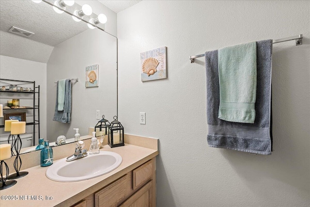 724 Middle Branch Way, Fruit Cove, FL 32259 - bathroom with vanity and a textured ceiling