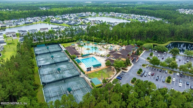 724 Middle Branch Way, Fruit Cove, FL 32259 - view of property location with a heavily wooded area, a nearby body of water, and a pool area