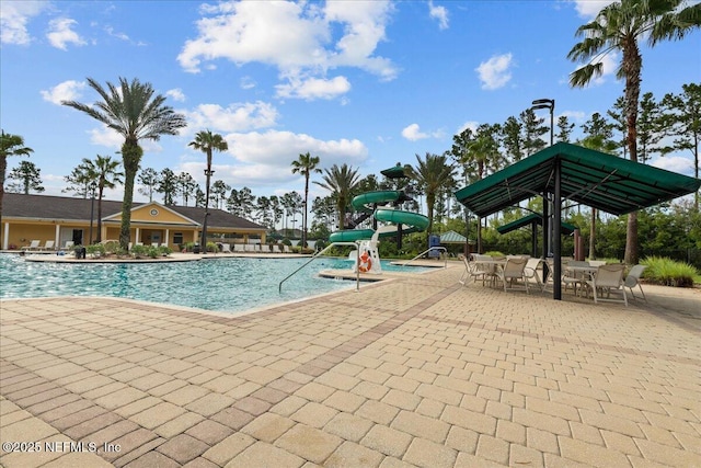 724 Middle Branch Way, Fruit Cove, FL 32259 - community pool with a water slide and a patio area