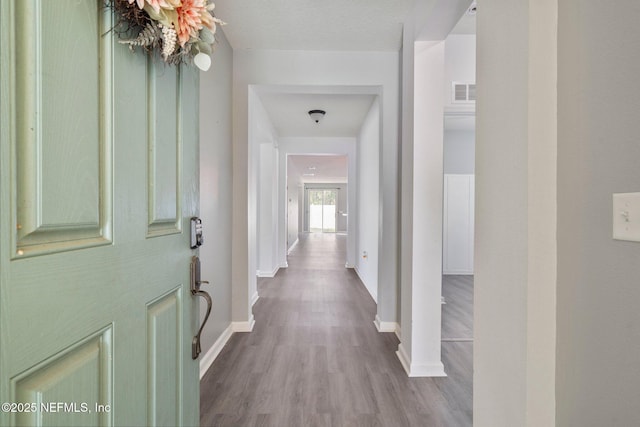 4916 Creek Bluff Ln, Middleburg, FL 32068 - entryway with baseboards and wood finished floors