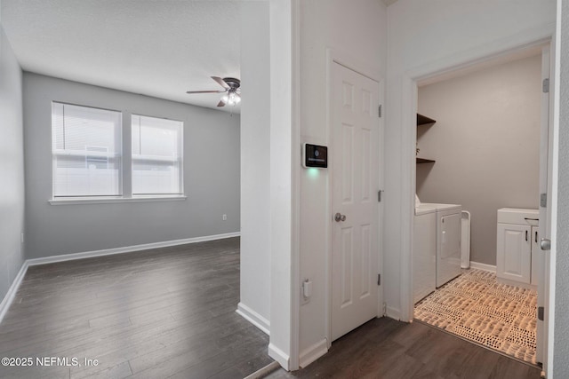 4916 Creek Bluff Ln, Middleburg, FL 32068 - laundry area featuring independent washer and dryer, a ceiling fan, dark wood finished floors, and baseboards