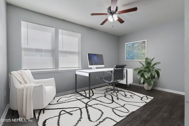 4916 Creek Bluff Ln, Middleburg, FL 32068 - office area with wood finished floors, a ceiling fan, and baseboards