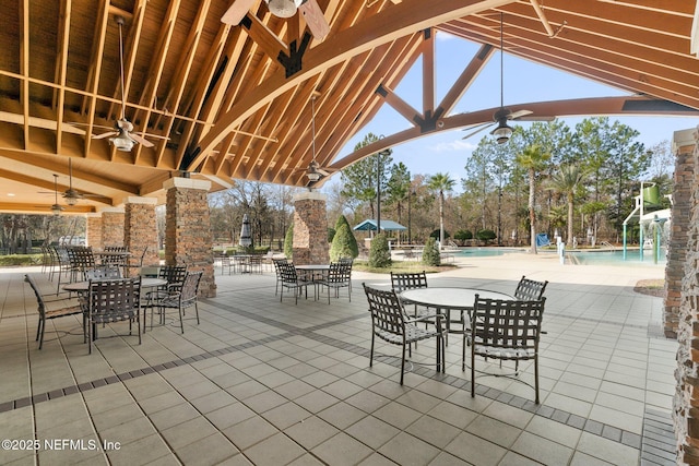 4916 Creek Bluff Ln, Middleburg, FL 32068 - view of patio with ceiling fan, a community pool, and outdoor dining space