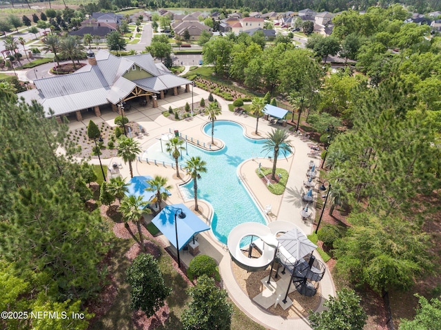 4916 Creek Bluff Ln, Middleburg, FL 32068 - drone / aerial view of a pool and a tree filled landscape