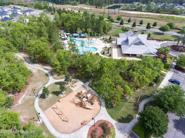 4916 Creek Bluff Ln, Middleburg, FL 32068 - drone / aerial view of a pool and a tree filled landscape
