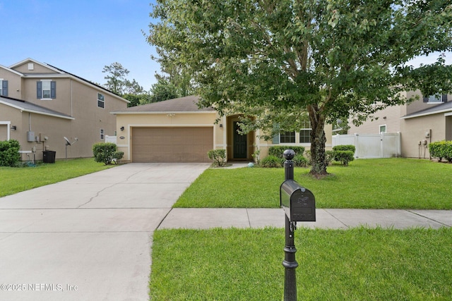 4916 Creek Bluff Ln, Middleburg, FL 32068 - view of front of house featuring an attached garage, concrete driveway, and stucco siding