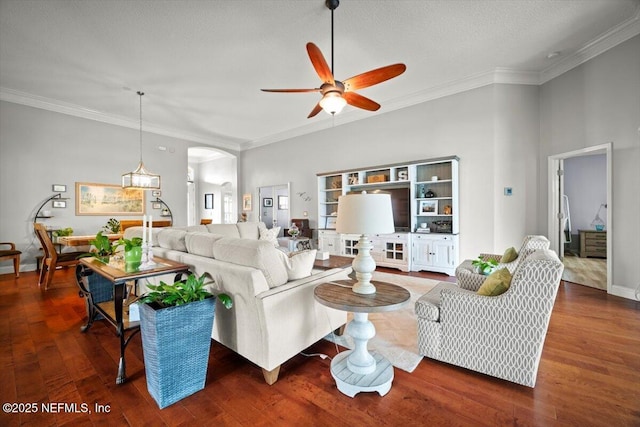 1714 Chatham Village Dr, Fleming Island, FL 32003 - living area featuring ceiling fan, arched walkways, ornamental molding, and wood finished floors