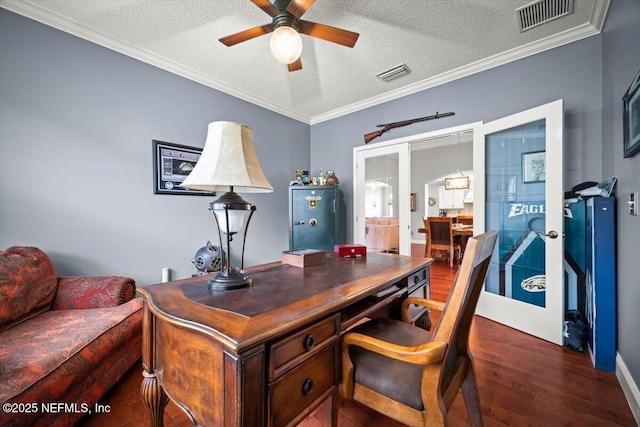 1714 Chatham Village Dr, Fleming Island, FL 32003 - home office with a textured ceiling, dark wood-style flooring, a ceiling fan, and crown molding