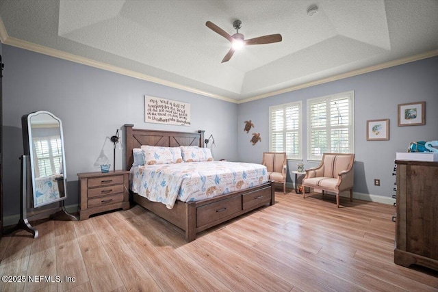 1714 Chatham Village Dr, Fleming Island, FL 32003 - bedroom with a raised ceiling, light wood finished floors, multiple windows, ornamental molding, and ceiling fan