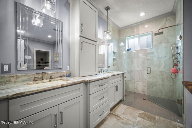 1714 Chatham Village Dr, Fleming Island, FL 32003 - bathroom featuring crown molding, double vanity, a stall shower, a textured ceiling, and marble finish flooring