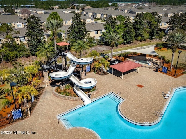 1714 Chatham Village Dr, Fleming Island, FL 32003 - community pool featuring a water slide