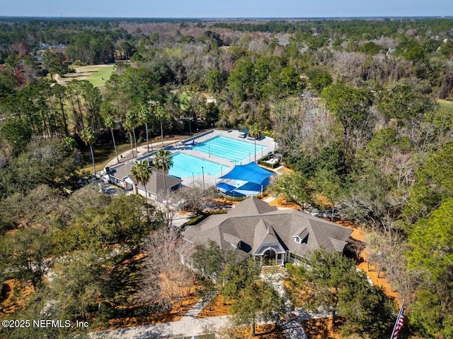 1714 Chatham Village Dr, Fleming Island, FL 32003 - drone / aerial view of a pool area and a forest