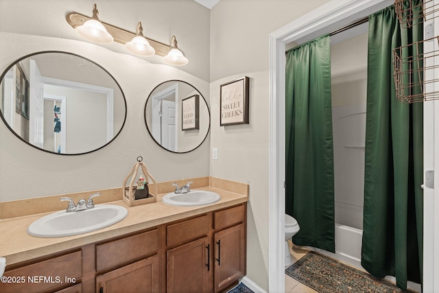 3172 Treeside Ln, Green Cove Springs, FL 32043 - full bathroom featuring toilet, double vanity, shower / bath combo, and tile patterned flooring