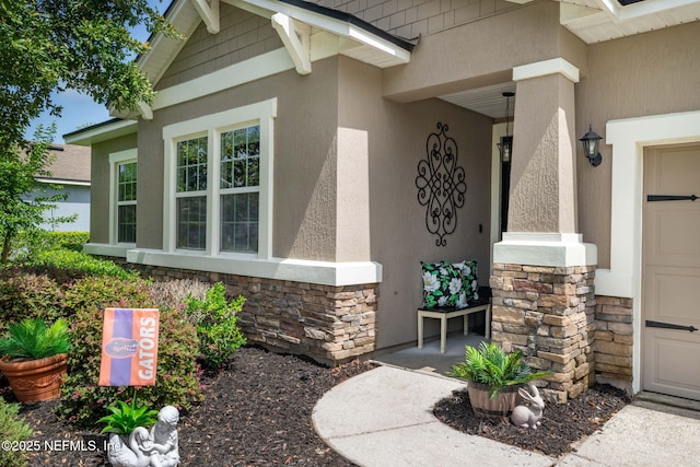 3172 Treeside Ln, Green Cove Springs, FL 32043 - property entrance with stone siding and stucco siding