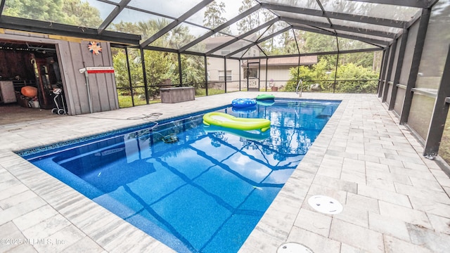 1165 5th St, Macclenny, FL 32063 - swimming pool with a patio and glass enclosure