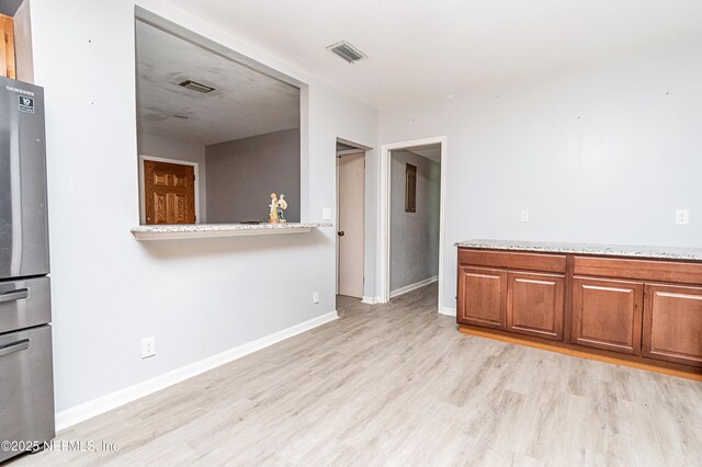 1165 5th St, Macclenny, FL 32063 - empty room with light wood-style floors