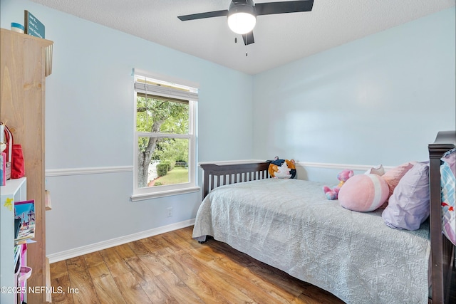 2760 Graniteridge Ct, Orange Park, FL 32065 - bedroom featuring wood finished floors, baseboards, and ceiling fan