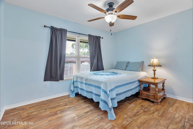 2760 Graniteridge Ct, Orange Park, FL 32065 - bedroom with light wood-style floors, baseboards, and ceiling fan