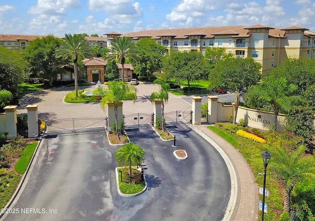 4300 S Beach Pkwy Unit 3214, Jacksonville Beach, FL 32250 - view of front facade with a gate and a residential view