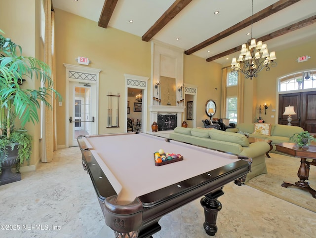 4300 S Beach Pkwy Unit 3214, Jacksonville Beach, FL 32250 - recreation room with a high ceiling, beamed ceiling, and a chandelier