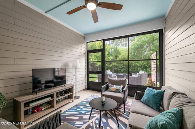 3603 Marsh Reserve Blvd, Jacksonville, FL 32224 - living area with wooden walls and ceiling fan