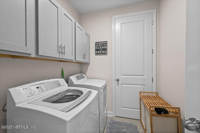 3603 Marsh Reserve Blvd, Jacksonville, FL 32224 - laundry area featuring washer and dryer and cabinet space