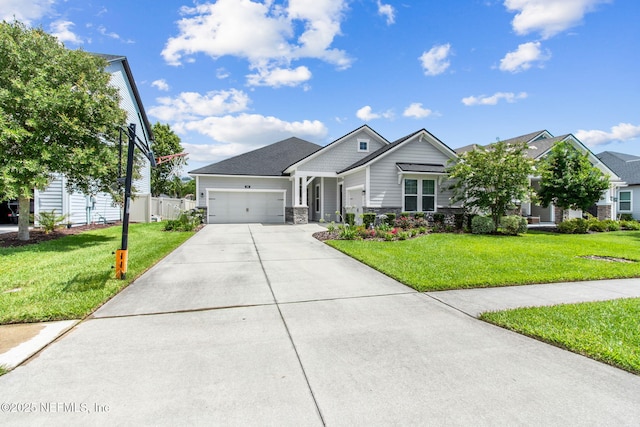 101 Bucktail Ave, Ponte Vedra, FL 32081 - craftsman inspired home with a front lawn, an attached garage, concrete driveway, and stone siding