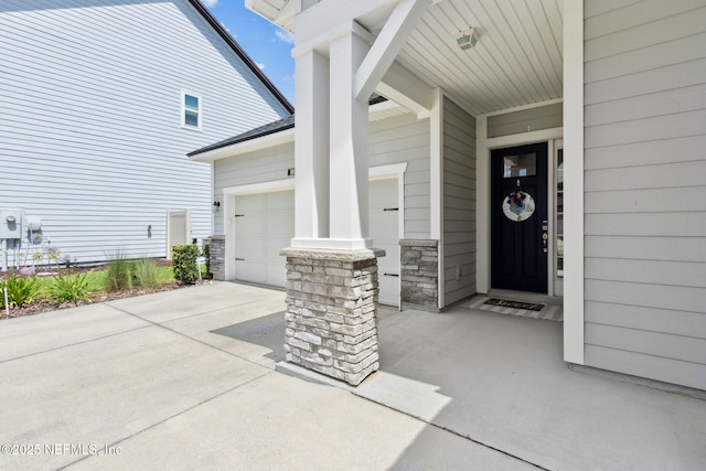 101 Bucktail Ave, Ponte Vedra, FL 32081 - entrance to property with concrete driveway, a garage, and stone siding