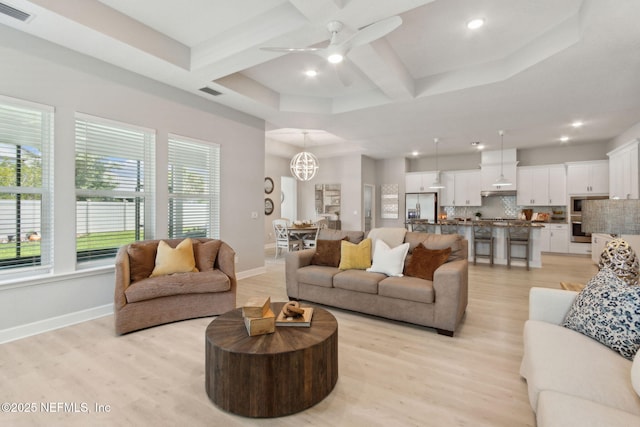 101 Bucktail Ave, Ponte Vedra, FL 32081 - living area featuring coffered ceiling, light wood-style floors, ceiling fan, recessed lighting, and a chandelier