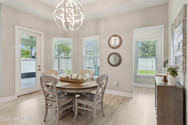 101 Bucktail Ave, Ponte Vedra, FL 32081 - dining space featuring light wood-style floors, healthy amount of natural light, and a chandelier