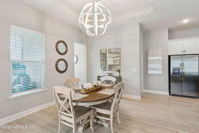 101 Bucktail Ave, Ponte Vedra, FL 32081 - dining room with a chandelier and light wood finished floors