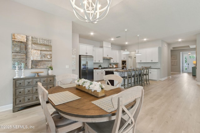 101 Bucktail Ave, Ponte Vedra, FL 32081 - dining room with a chandelier, light wood-style floors, and recessed lighting