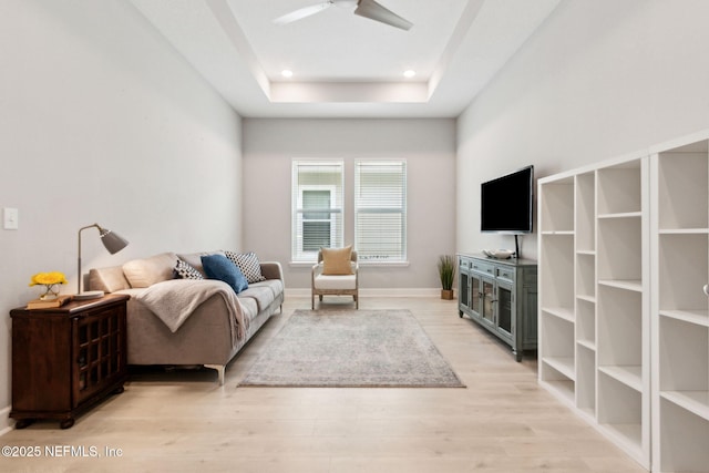 101 Bucktail Ave, Ponte Vedra, FL 32081 - living area featuring light wood-style flooring, a ceiling fan, a raised ceiling, and recessed lighting