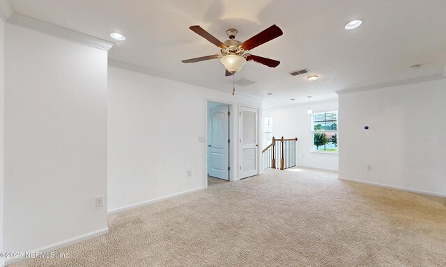 4171 Fishing Creek Ln, Middleburg, FL 32068 - spare room with light colored carpet, a ceiling fan, ornamental molding, baseboards, and recessed lighting