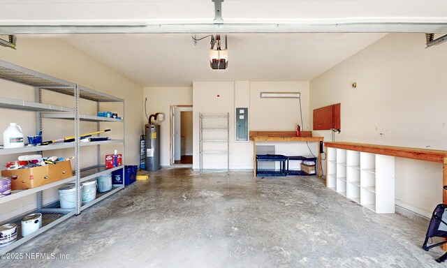 4171 Fishing Creek Ln, Middleburg, FL 32068 - garage featuring electric panel, water heater, and a workshop area
