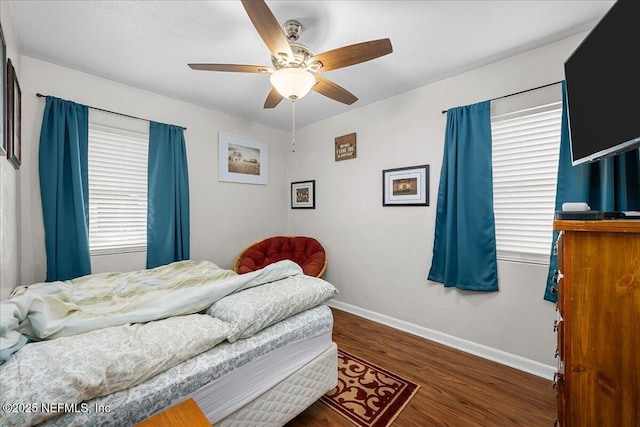 2205 Diana Dr, Palatka, FL 32177 - bedroom featuring baseboards, wood finished floors, and ceiling fan