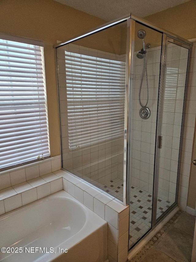 424 Bay Point Way N, Saint Johns, FL 32259 - bathroom with a bath, a shower stall, and tile patterned floors